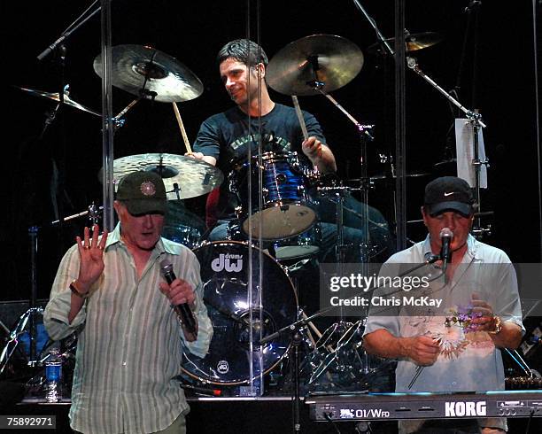 John Stamos performs with Mike Love and Bruce Johnston of The Beach Boys