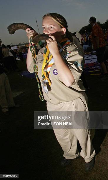 Scout blows a horn following a special ceremony on Brownsea Island off the south coast of England, 01 August 2007, as a part of the Centenary of the...