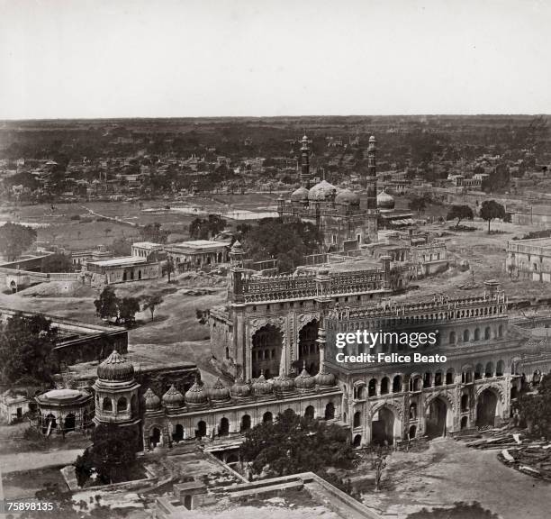 The wall of the Bara Imambara in Lucknow, looking north-east towards the Gomti River, shortly after the Indian Mutiny, circa 1858. Centre right are...