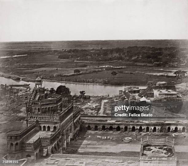 The Rumi Darwaza or Turkish Gate in Lucknow, looking north from the roof of the Bara Imambara, shortly after the Indian Mutiny, circa 1858. The Gomti...