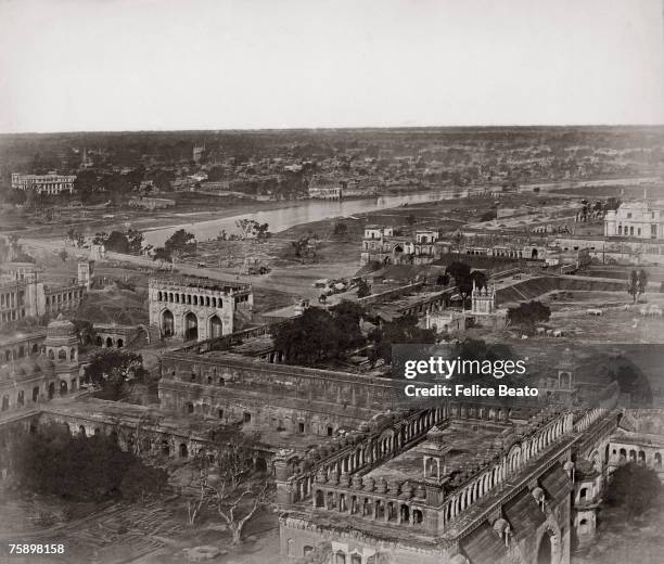 View eastwards over the city of Lucknow, taken from the roof of the Bara Imambara shortly after the Indian Mutiny, circa 1858. The Gomti River is...