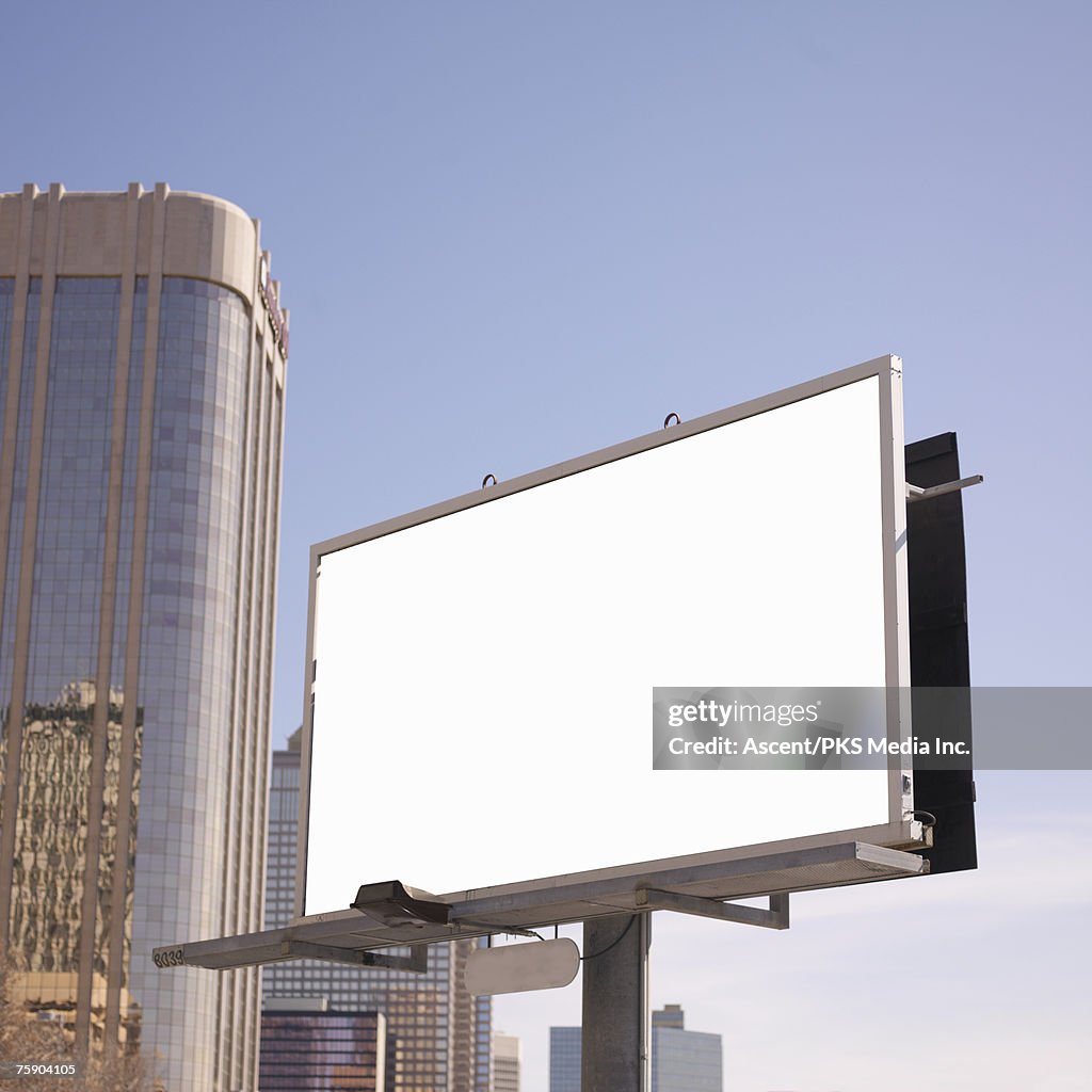 Blank billboard in downtown setting