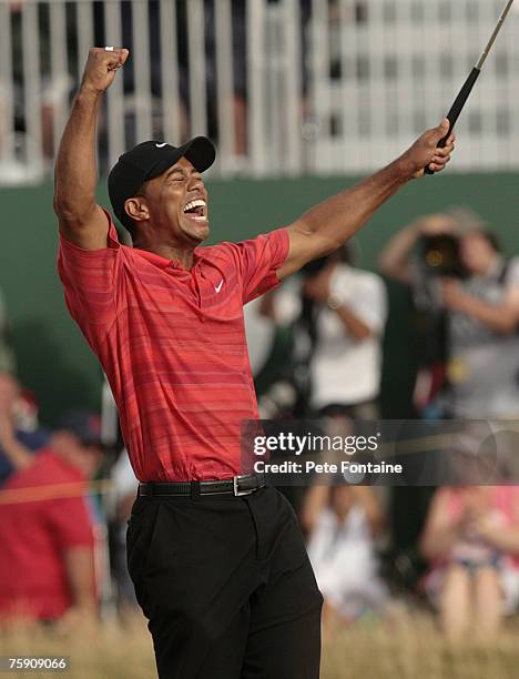 Tiger Woods celebrates on the 18th green after winning the 135th Open Championship at Royal Liverpool Golf Club in Hoylake, Great Britain on July 23,...