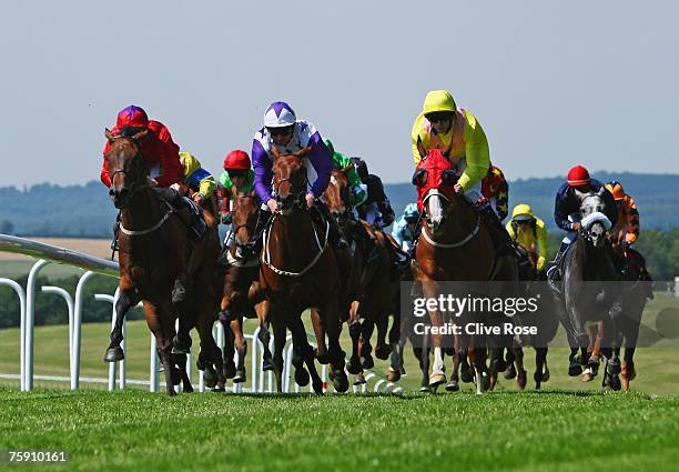 Steve Browne on Secret Ploy leads the field during The Invesco Perpetual Goodwood stakes run at Goodwood Racecourse on August 1 in Goodwood, England....