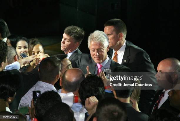 Former President William Jefferson Clinton greets the audience in attendance at the Clinton Foundation Millennium Network Reception held at Roseland...