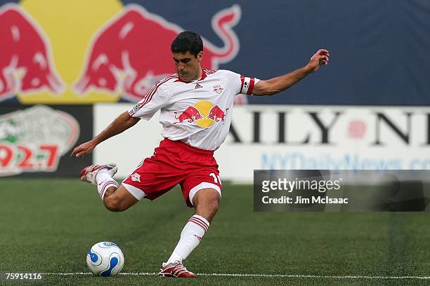 Claudio Reyna of the New York Red Bulls handles the ball against the New England Revolution on July 14, 2007 at Giants Stadium in East Rutherford,...