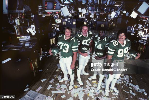 Joe Klecko, Marty Lyons, Abdul Salaam and Mark Gastineau of the New York Jets also known as "The Sack Exchange" pose of the floor of the New York...