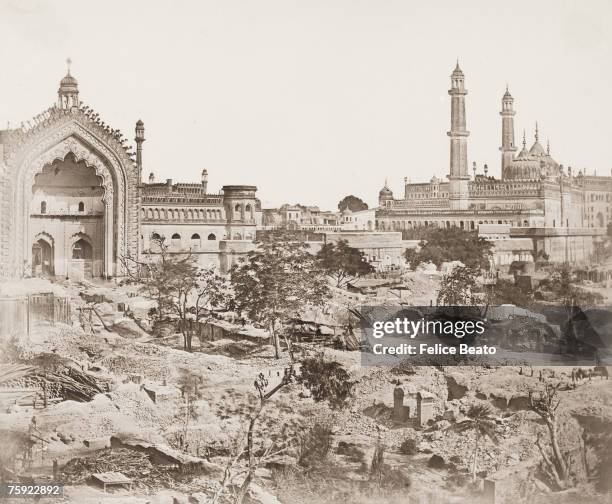 The Rumi Darwaza or Turkish Gate in Lucknow, shortly after the Indian Mutiny, 1858. The Asafi Masjid or mosque, part of the Bara Imambara complex, is...