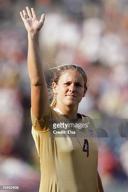Cat Whitehill of the USA waves to the crowd before the game against Norway during the Women's World Cup Send-Off Series on July 14, 2007 at...