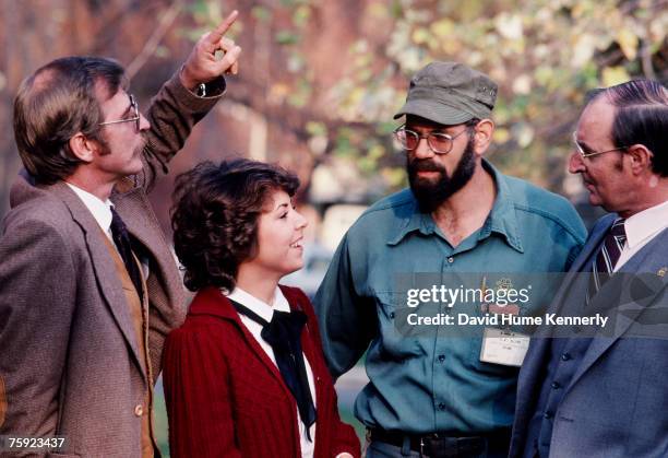 Air Florida Flight 90 crash survivors Joseph Stiley, Patricia Felch, Roger Olian, and Bert Hamilton, pose for a photo on November 15, 1982 in...