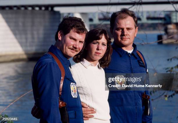 Air Florida Flight 90 survivor Kelly Duncan, rescue team Pilot Donald Usher , and Paramedic Melvin Windsor pose for a photo on November 15, 1982 in...