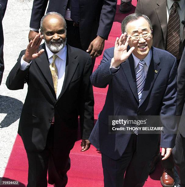 Haitian president Rene Preval and United Nations Secretary General Ban Ki-moon wave 01 August 2007 in Port-au-Prince. Ban Ki-moon is in Haiti for a...