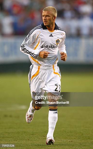 David Beckham of the Los Angeles Galaxy runs into position shortly after entering the game in the World Series of Football match against Chelsea FC...