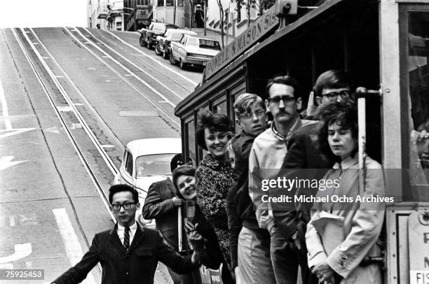 The cable cars are a noted feature of the city, even if they don't climb halfway to the stars, in early summer 1967 in San Francisco, California.