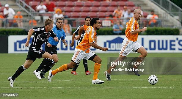 Houston's Dwayne De Rosario and Craig Waibel rush the ball up the field during game action between the Houston Dynamo and DC United in SuperLiga 2007...