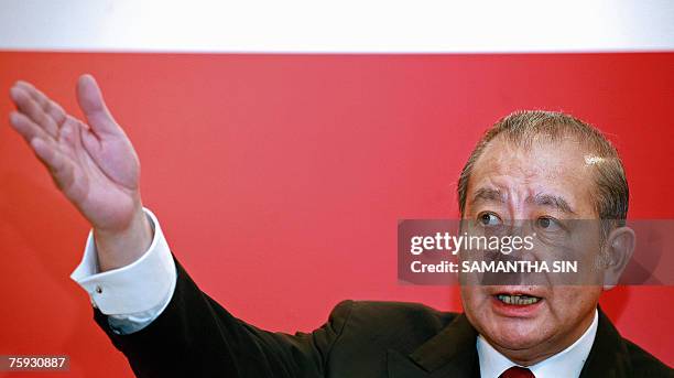 Bank of East Asia chairman David Li gestures during a press conference on the interim result of the bank in Hong Kong, 02 August 2007. The...