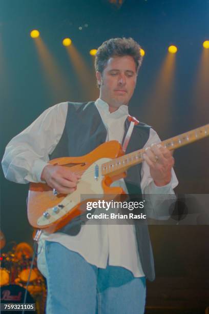 American country singer and musician, Vince Gill performs live on stage at the Royal Albert Hall in London in May 1994.