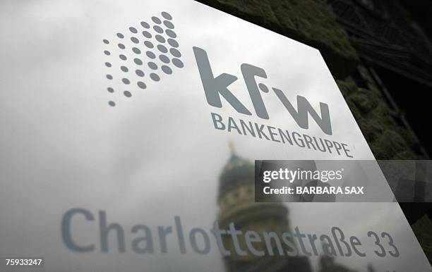 The cupola of Berlin's French Cathedral is reflected in a plate with the logo of the German KfW bank 02 August 2007 in Berlin. The government-owned...