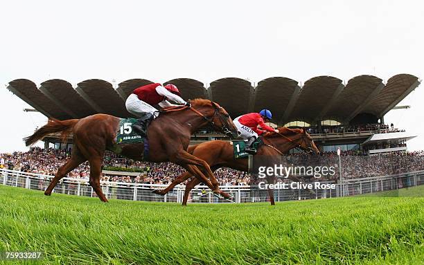Ryan Moore on Allegretto takes the lead to win from Philip Robinson on Veracity in the ABN Amro Goowwood Cup run at Goodwood Racecourse on August 2...