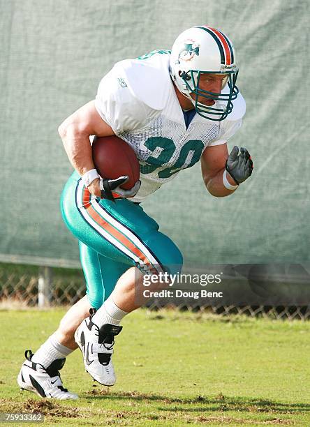 Running back Cory Schlesinger of the Miami Dolphins works out during training camp at Nova Southeastern University on August 2, 2007 in Davie,...