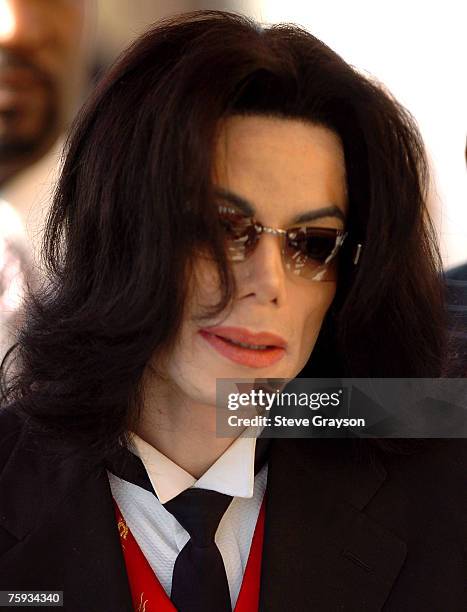 Michael Jackson arrives at the memorial service for Johnnie Cochran at West Angeles Cathederal in Los Angeles, California April 6, 2005