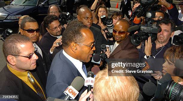 Simpson arrives at the memorial service for Johnnie Cochran at West Angeles Cathederal in Los Angeles, California April 6, 2005