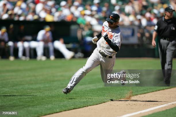 Nick Markakis of the Baltimore Orioles runs during the game against the Oakland Athletics at the McAfee Coliseum in Oakland, California on July 22,...