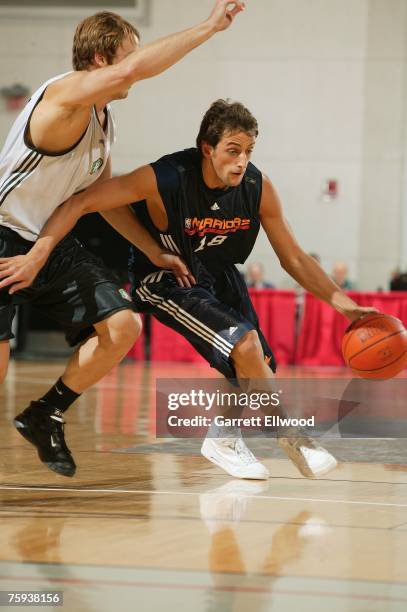 Marco Belinelli of the Golden State Warriors drives upcourt during Game 1 of the NBA Summer League against the New Orleans Hornets on July 7, 2007 at...