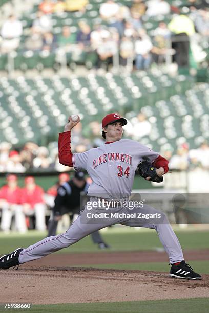 Homer Bailey of the Cincinnati Reds pitches during the game against the Oakland Athletics at the McAfee Coliseum in Oakland, California on June 19,...