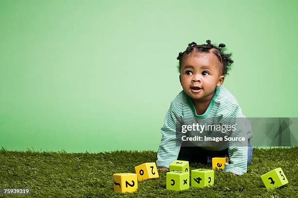 baby with building blocks - baby blocks stock pictures, royalty-free photos & images