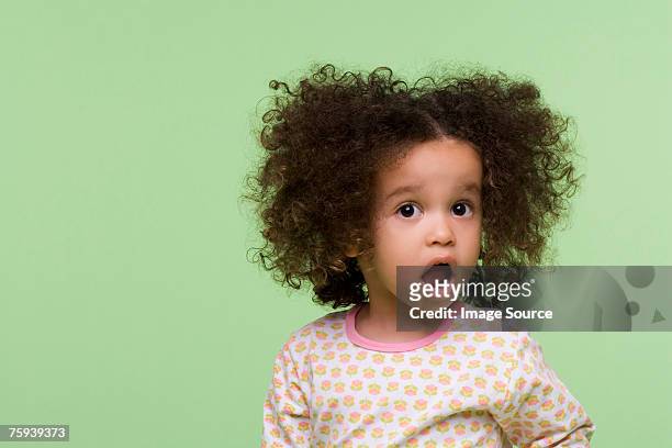 surprised girl - child shock studio stock pictures, royalty-free photos & images