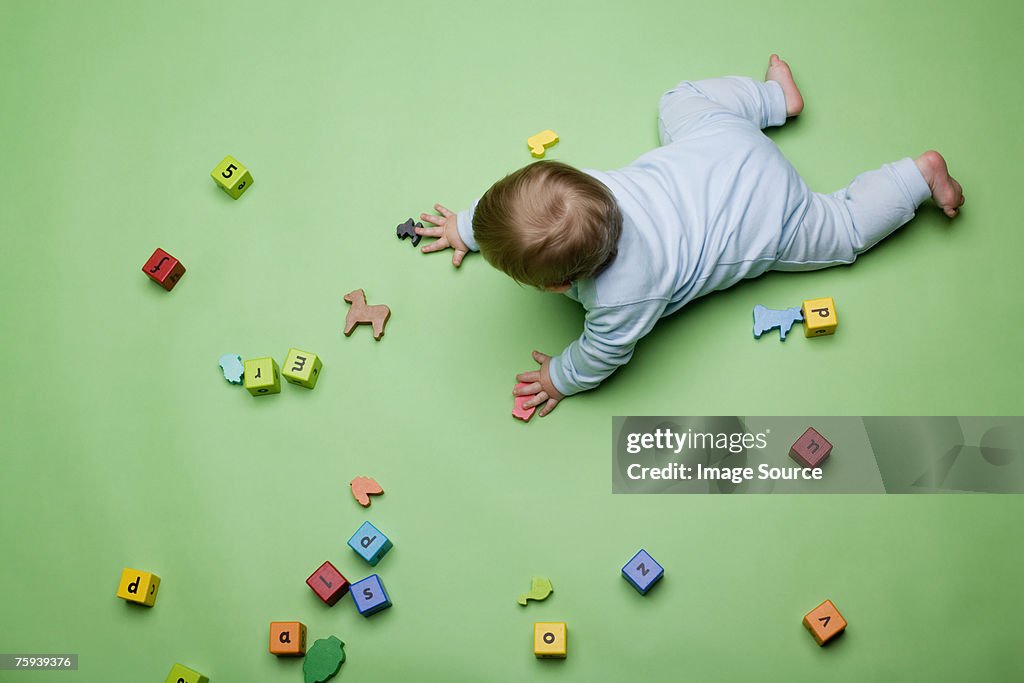 Baby with building blocks