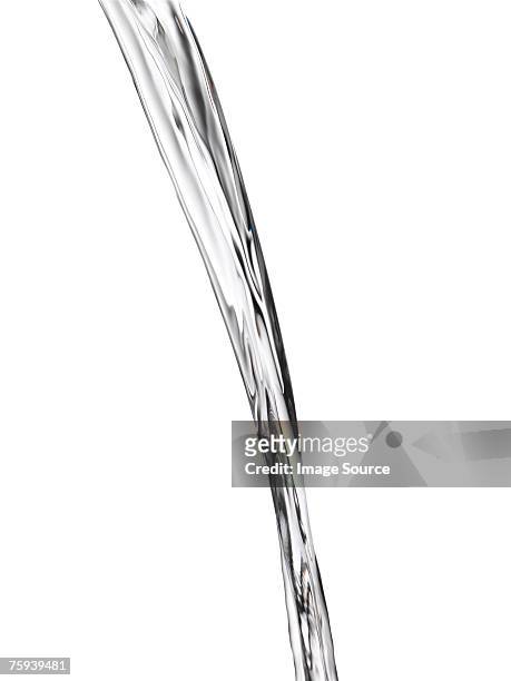 water pouring - pouring stock pictures, royalty-free photos & images