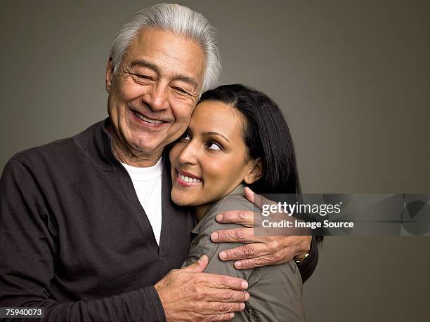 father and daughter - family on coloured background stock pictures, royalty-free photos & images