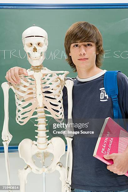 boy with skeleton - funny skeleton stockfoto's en -beelden