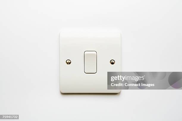 light switch - light switch stock pictures, royalty-free photos & images