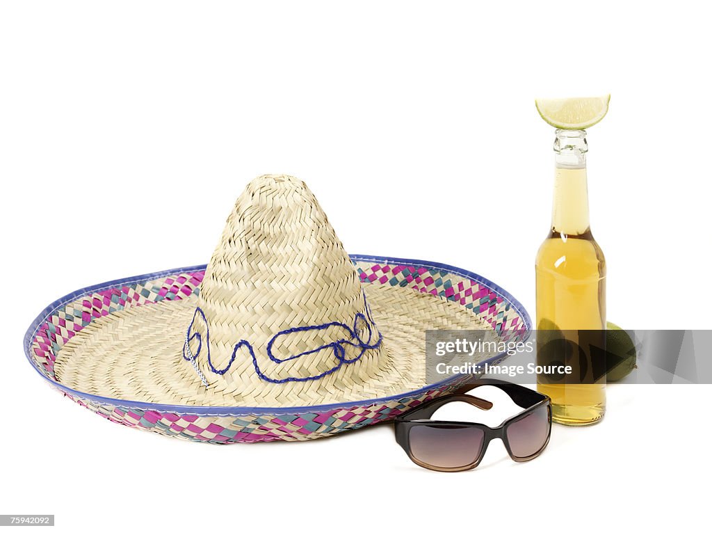 Sombrero and bottle of lager
