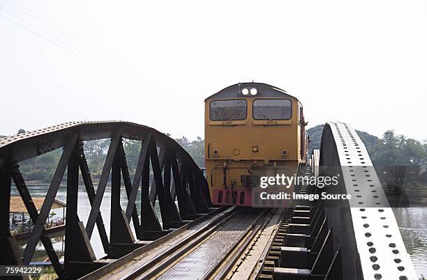 train on bridge over river kwai - ponte ferroviária imagens e fotografias de stock