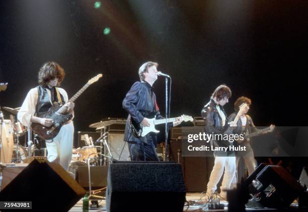 Rock and roll guitarists Eric Clapton, Jeff Beck and Jimmy Page perform onstage at the ARMS Charity Concert at the Royal Albert Concert Hall in...