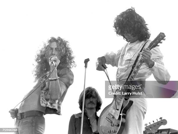 Singer Robert Plant, bassist John Paul Jones and guitarist Jimmy Page of the "Led Zeppelin" perform at Kezar Stadium on June 2, 1973 in San...