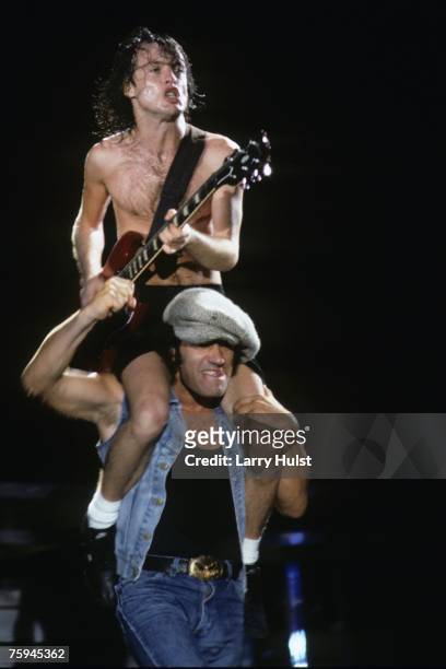 Singer Brian Johnson and guitarist Angus Young perform with AC/DC at Cal Expo in Sacramento, California on July 30, 1992.