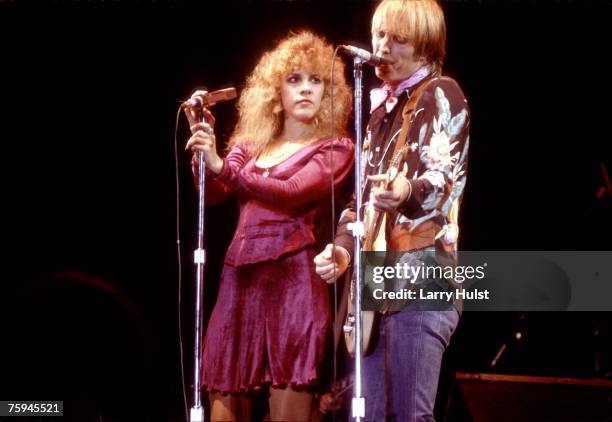 Musicians Tom Petty & Stevie Nicks perform onstage in 1981.