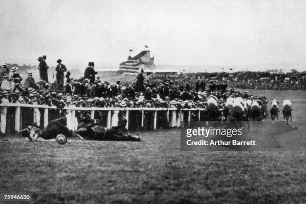 Emily Davison is fatally injured as she tries to stop the King's horse 'Amner' at Epsom on Derby Day, to draw attention to the Women's Suffragette...