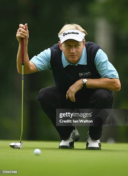 Philip Golding of England lines up a putt on th 16th hole during the second round of the Russian Open Golf Championship at the Moscow Country Club...