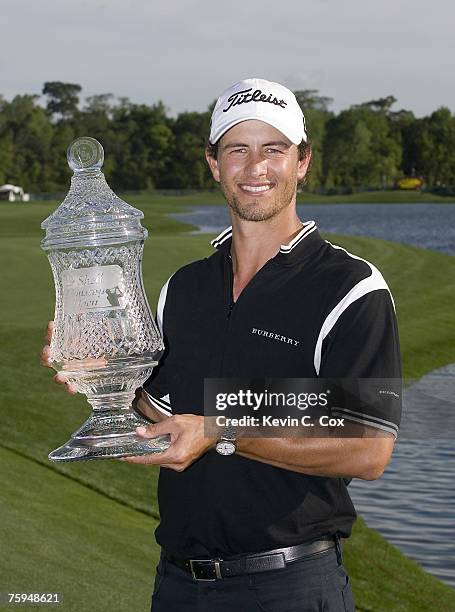 Adam Scott poses with the 2007 Shell Houston Open trophy Sunday, April 1 on the Tournament Course at the Redstone Golf Club in Humble, Texas.