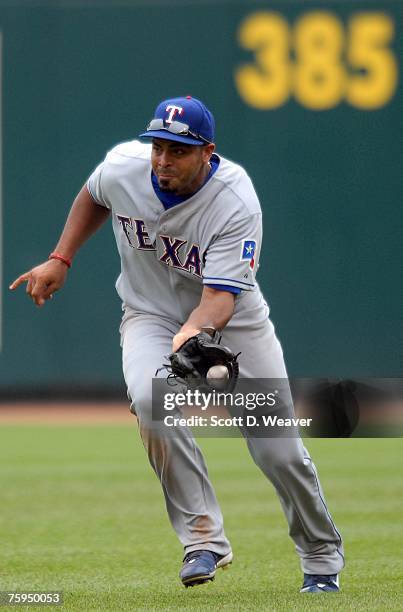 Nelson Cruz of the Texas Rangers catches a fly ball against the Kansas City Royals at Kauffman Stadium in Kansas City, Missouri on July 29, 2007. The...