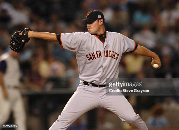 Noah Lowry of the San Francisco Giants delivers a pitch during their contest against the Arizona Diamondbacks at Bank One Ballpark in Phoenix,...
