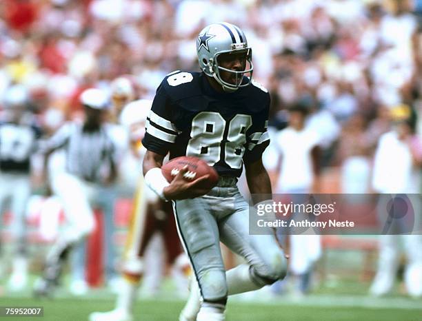 Dallas Cowboys wide receiver Drew Pearson scores on a touchdown in a 26-10 win over the Washington Redskins on 9/6/1981 at RFK Stadium.