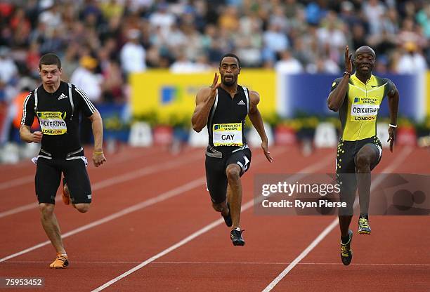 Craig Pickering of Great Britain , Tyson Gay of the USA and Francis Obikwelu of Portugal in action during Mens 100m Final during the Norwich Union...