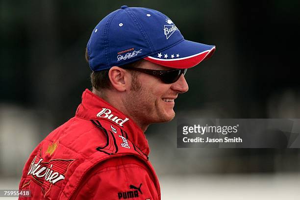 Dale Earnhardt Jr., driver of the Budweiser Chevrolet, looks on during qualifying for the NASCAR Nextel Cup Series Pennsylvania 500 at Pocono Raceway...